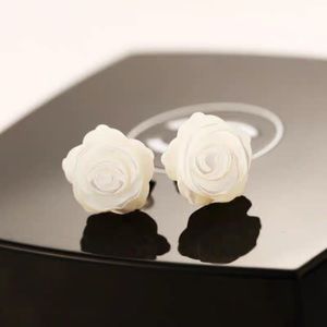 White Mother of Pearl 3D carved Rose studs